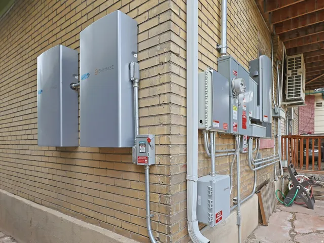 Exterior wall featuring two Enphase energy storage systems