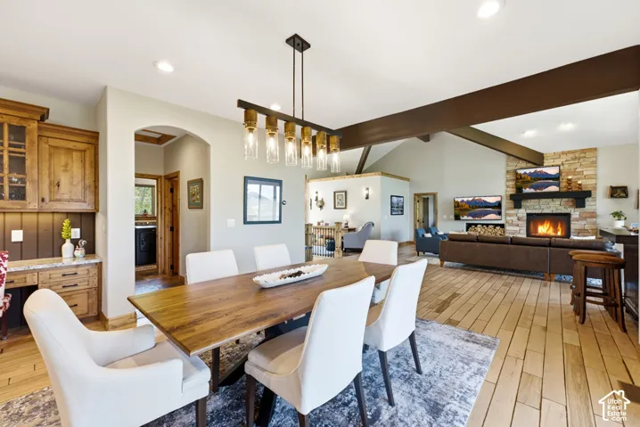 Open-concept living space with wood-finish flooring