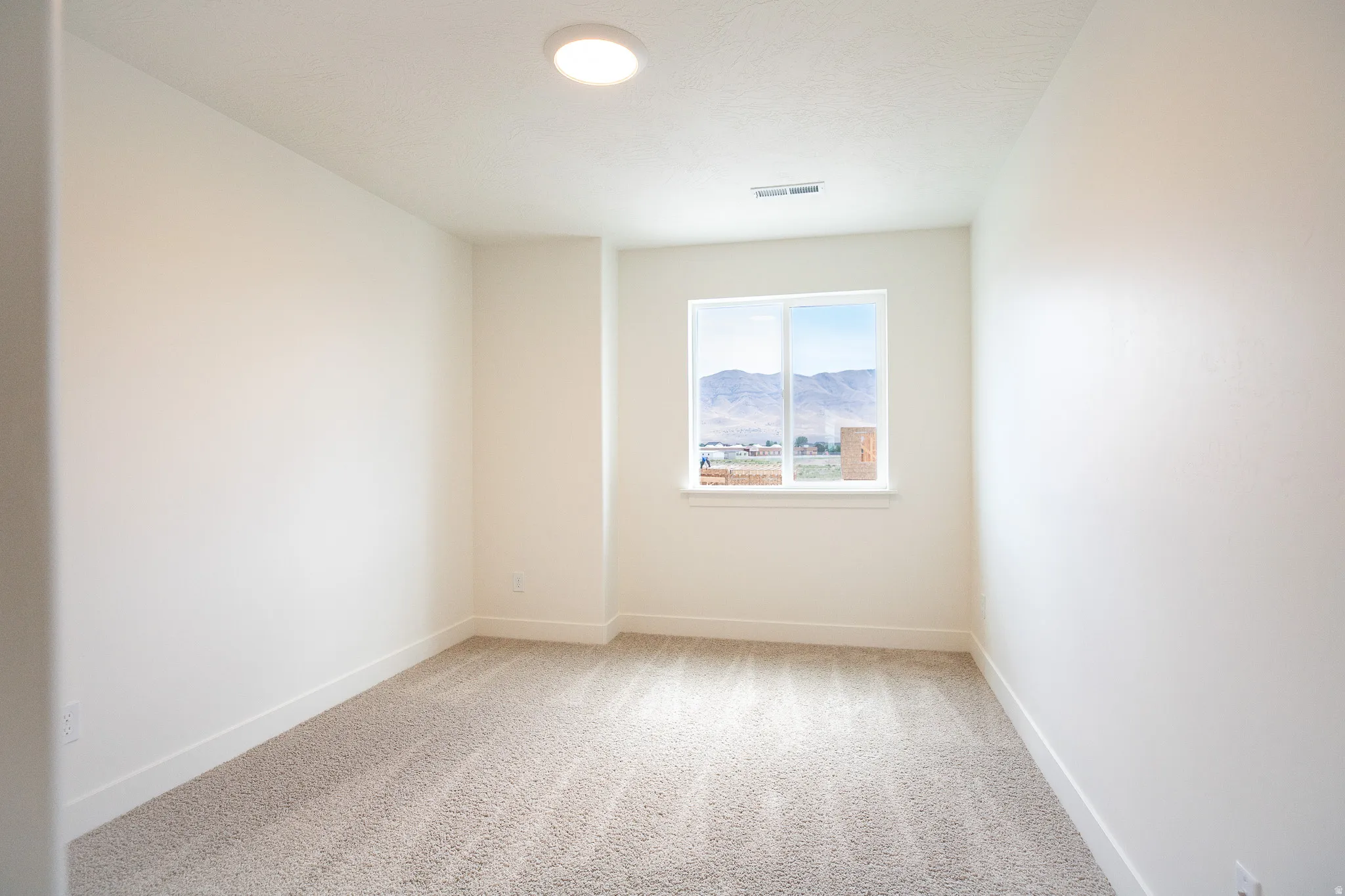 Full-size loft with easy option to convert to 5th bedroom.