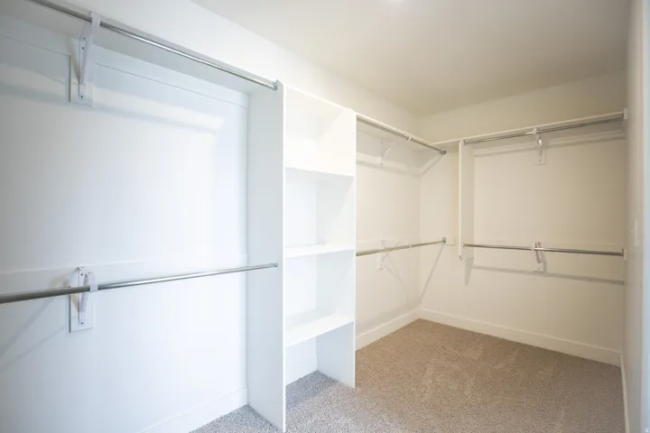 Huge walk-in closet as part of primary suite.