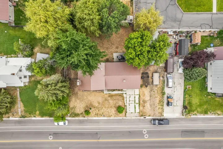 Property featuring mature trees and established landscaping