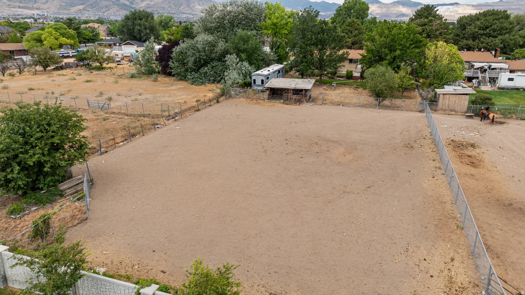 Expansive lot with perimeter fencing