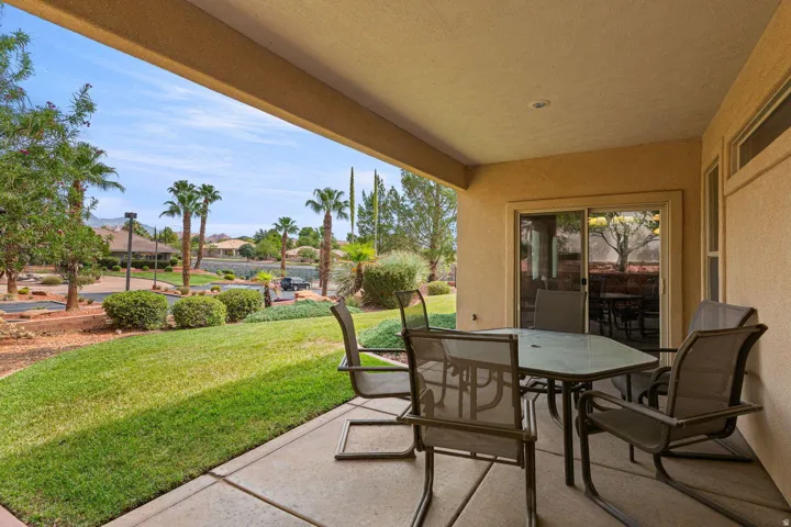 Covered patio with a concrete slab, providing outdoor living space