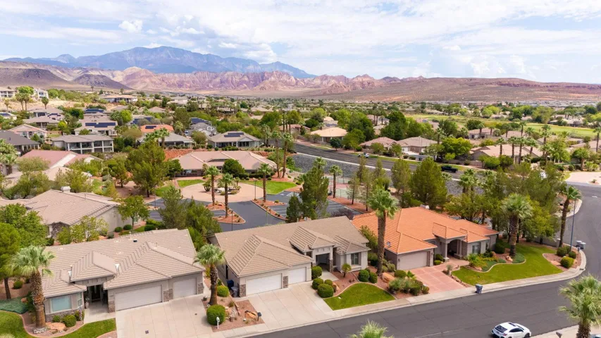 Aerial perspective showcasing a residential community with varied architectural styles and mature landscaping