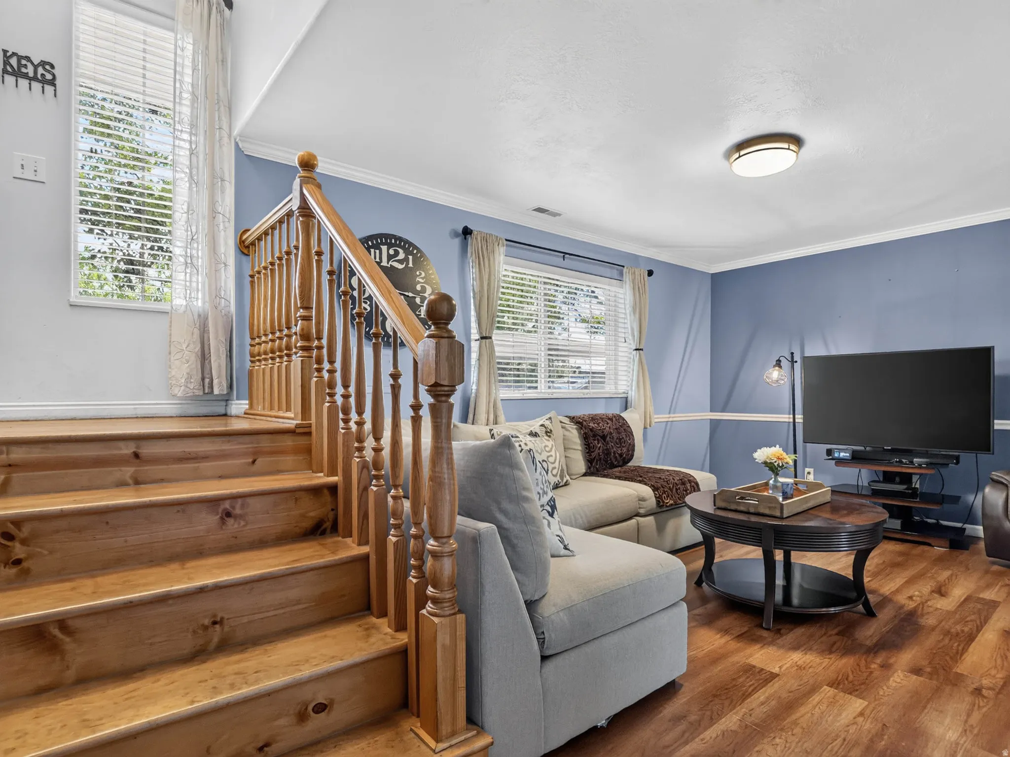 Hardwood staircase with traditional balusters