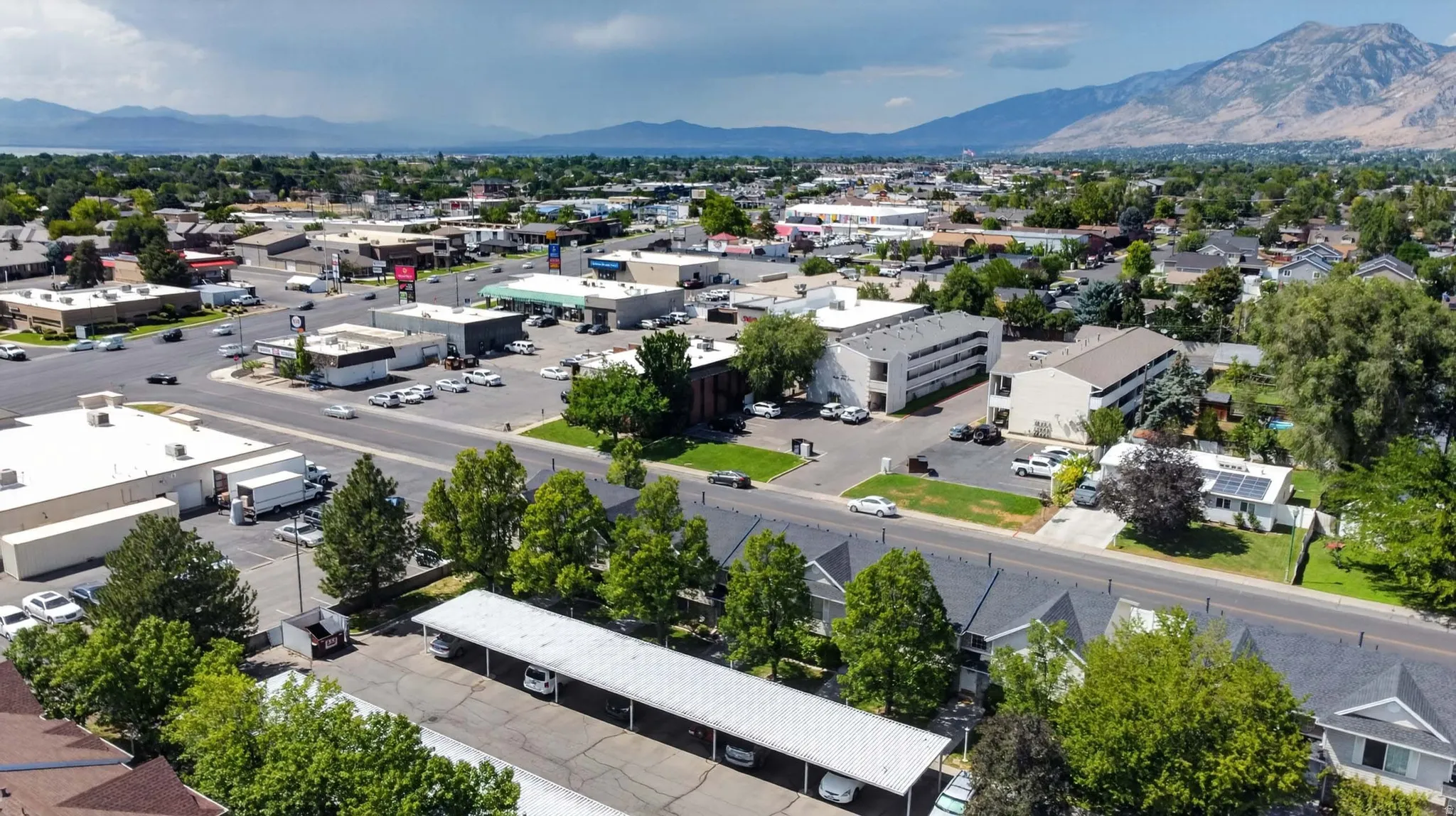 Aerial perspective capturing a developed area with varied commercial and residential structures
