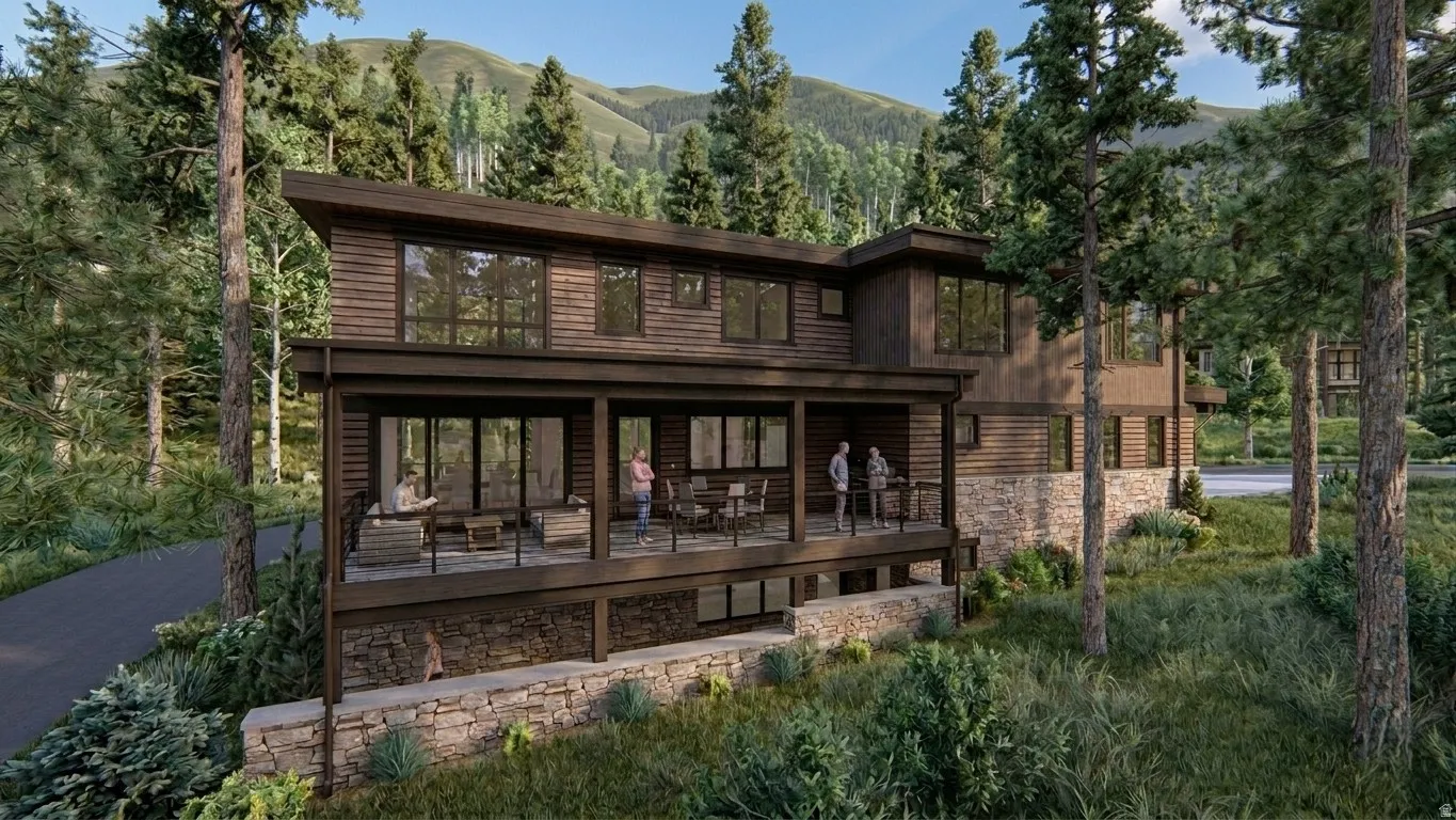 Contemporary multi-level residence featuring dark wood siding and a stone foundation