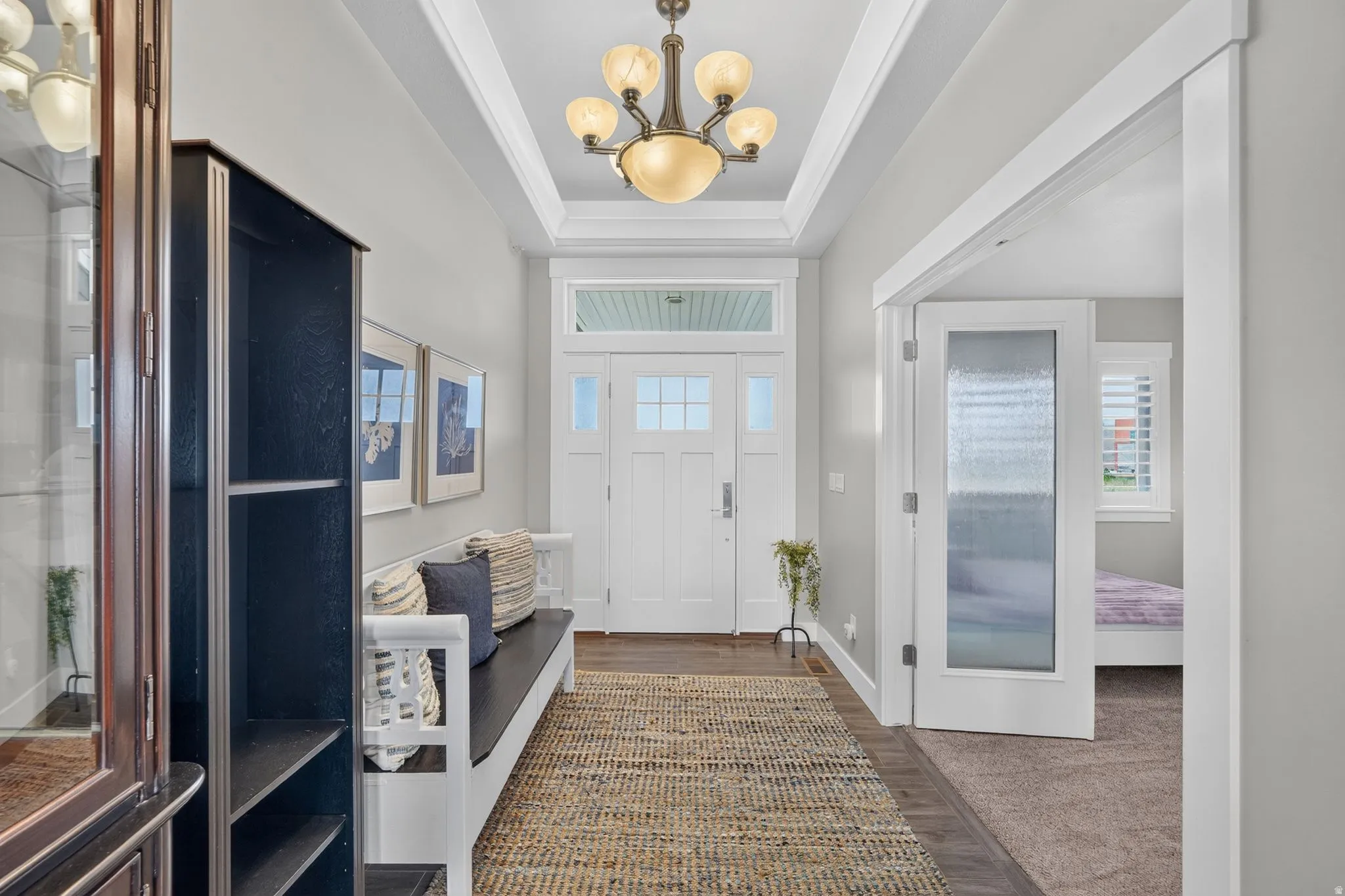 Entryway featuring a home office/ additional bedroom