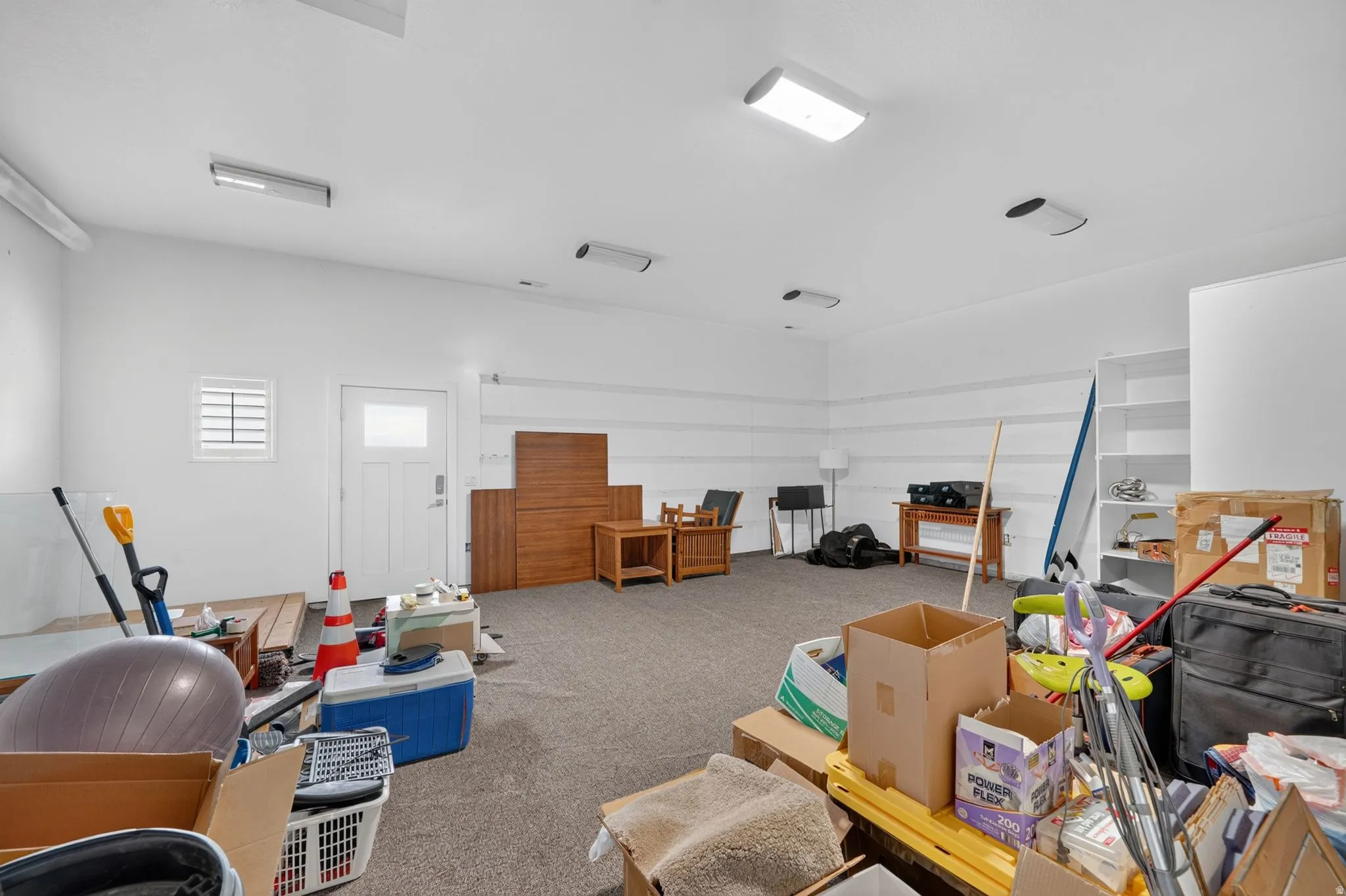 Additional storage room connected to garage with option to add more living space in the home if preferred