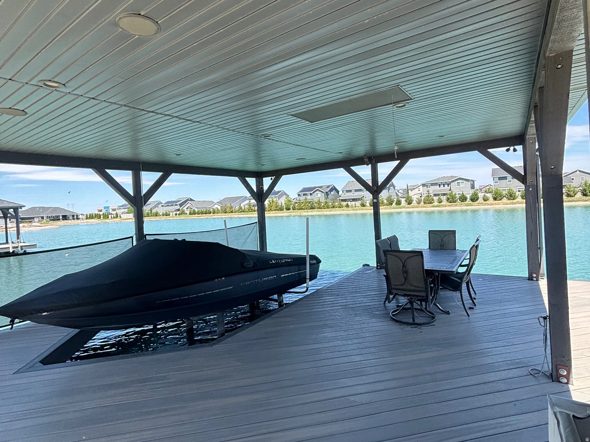 Potential boat dock with patio furniture