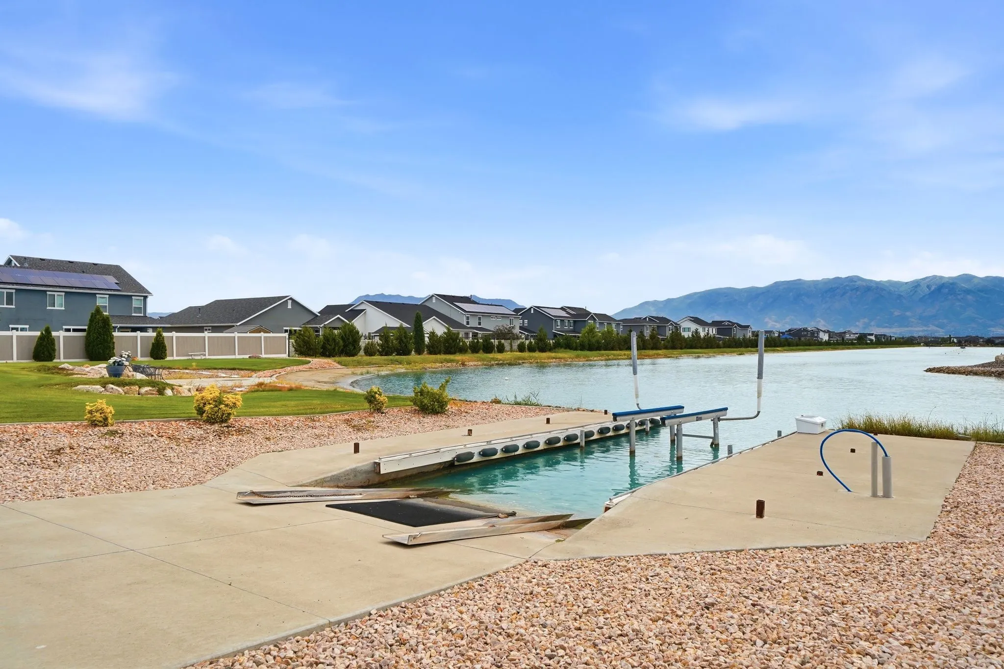 Private boat launch ramp from garage/ driveway access and boat lift