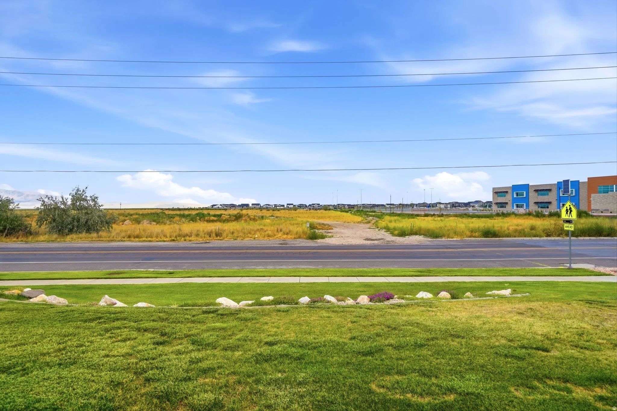 Front porch view with no front neighbors, walkable new StillWater Elementary school and future Syracuse park and sports fields