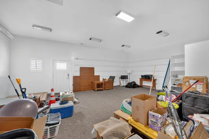 Additional storage room connected to garage with option to add more living space in the home if preferred