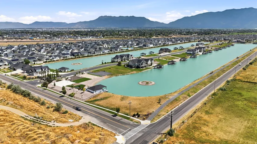 Two private community lakes with tunnel access between the two on the East end