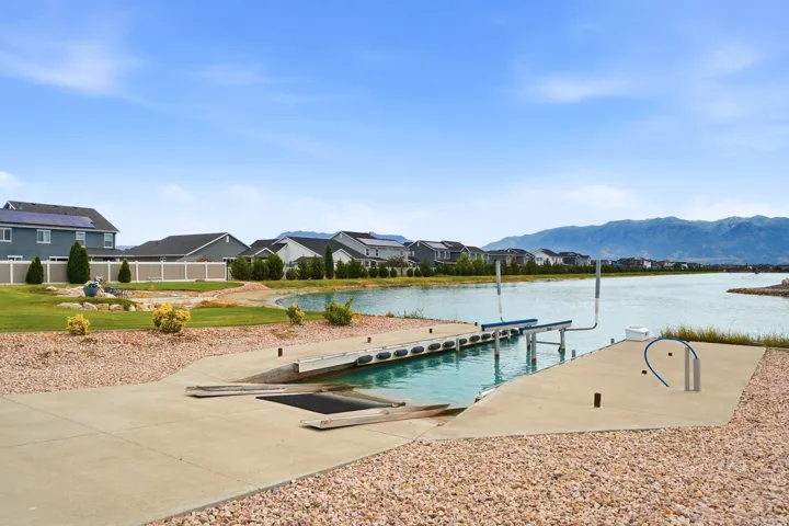 Private boat launch ramp from garage/ driveway access and boat lift