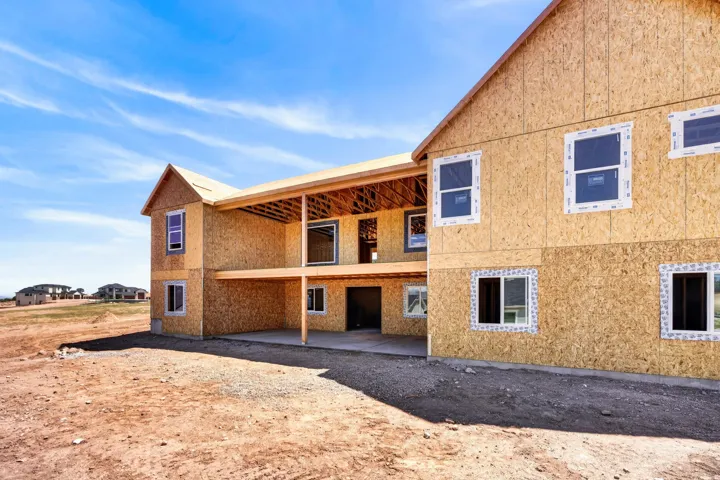 New construction opportunity featuring a two-story structure with exposed framing