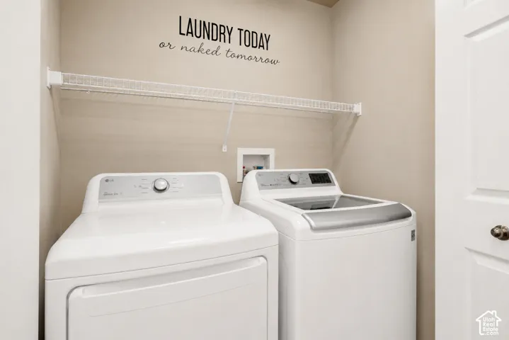 Laundry area featuring a wire storage shelf