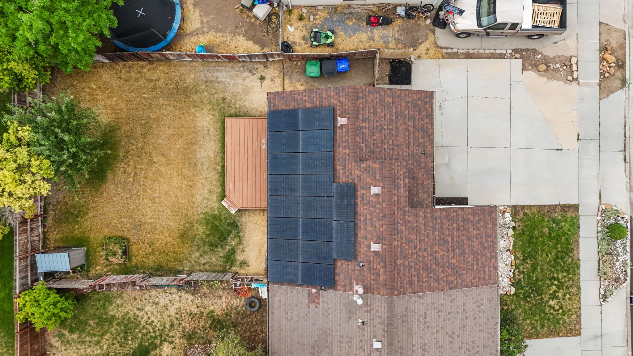 Aerial view of property and solar panels.