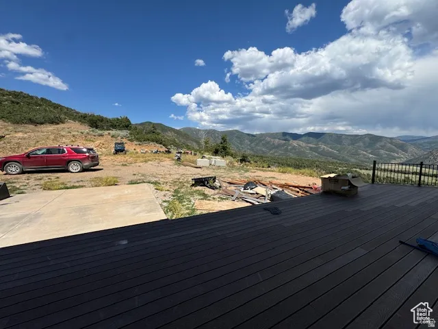 Expansive dark composite decking with metal railings