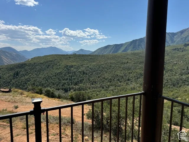 Expansive mountain scenery with abundant tree coverage