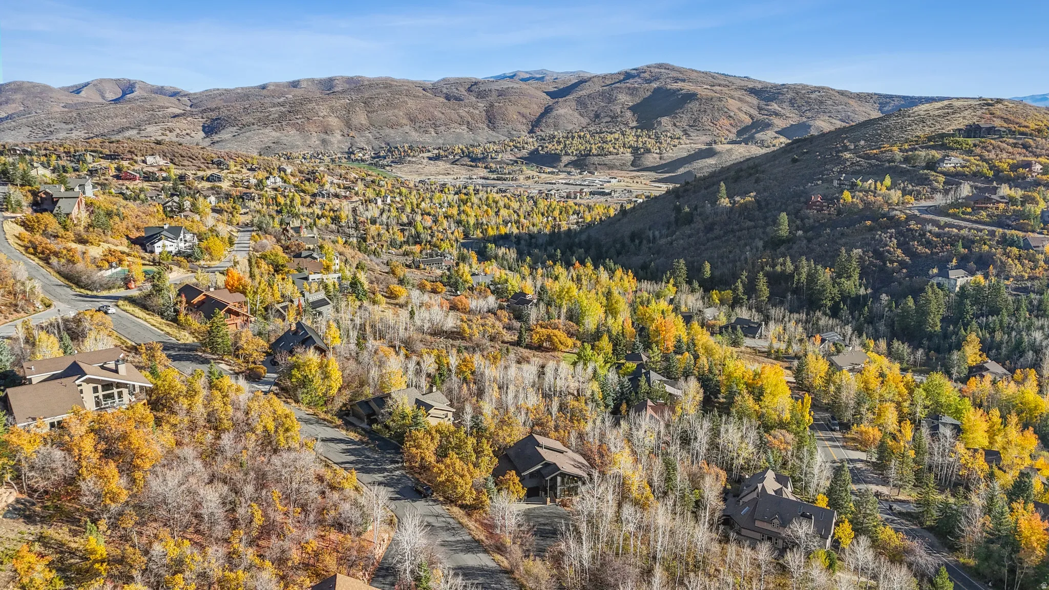 Sprawling residential landscape set amidst mountainous terrain