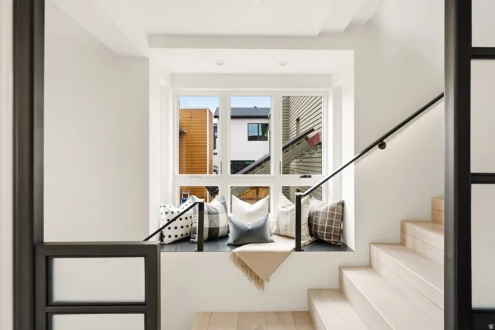 Built-in window seat featuring multiple panes and a solid surface