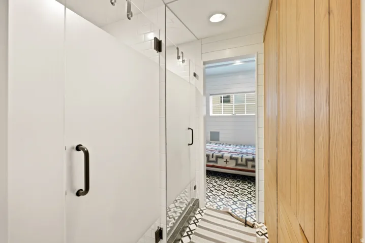 Frosted glass shower enclosure with matte black hardware