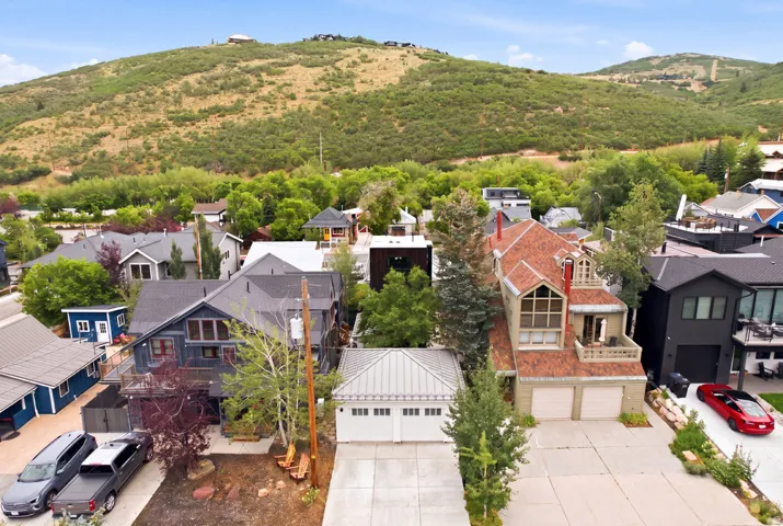 Expansive mountain backdrop framing a residential neighborhood