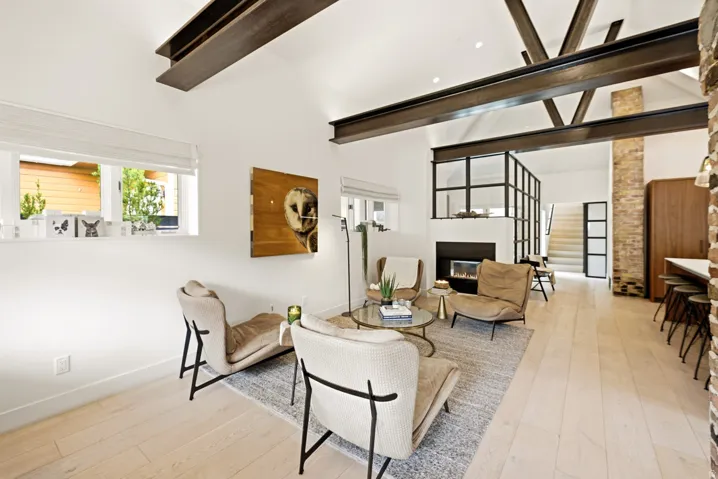 Vaulted ceiling featuring exposed structural beams