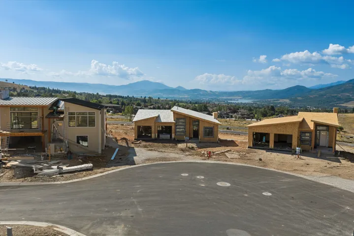 Three properties under construction featuring contemporary architectural designs