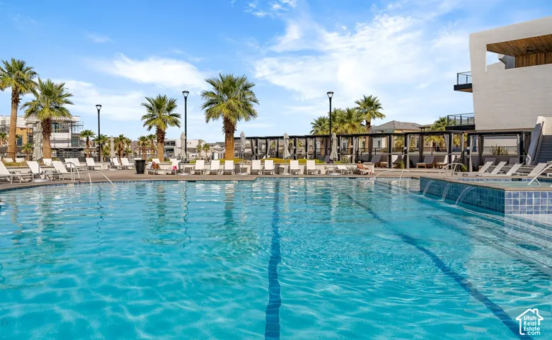 Expansive outdoor swimming pool with water features