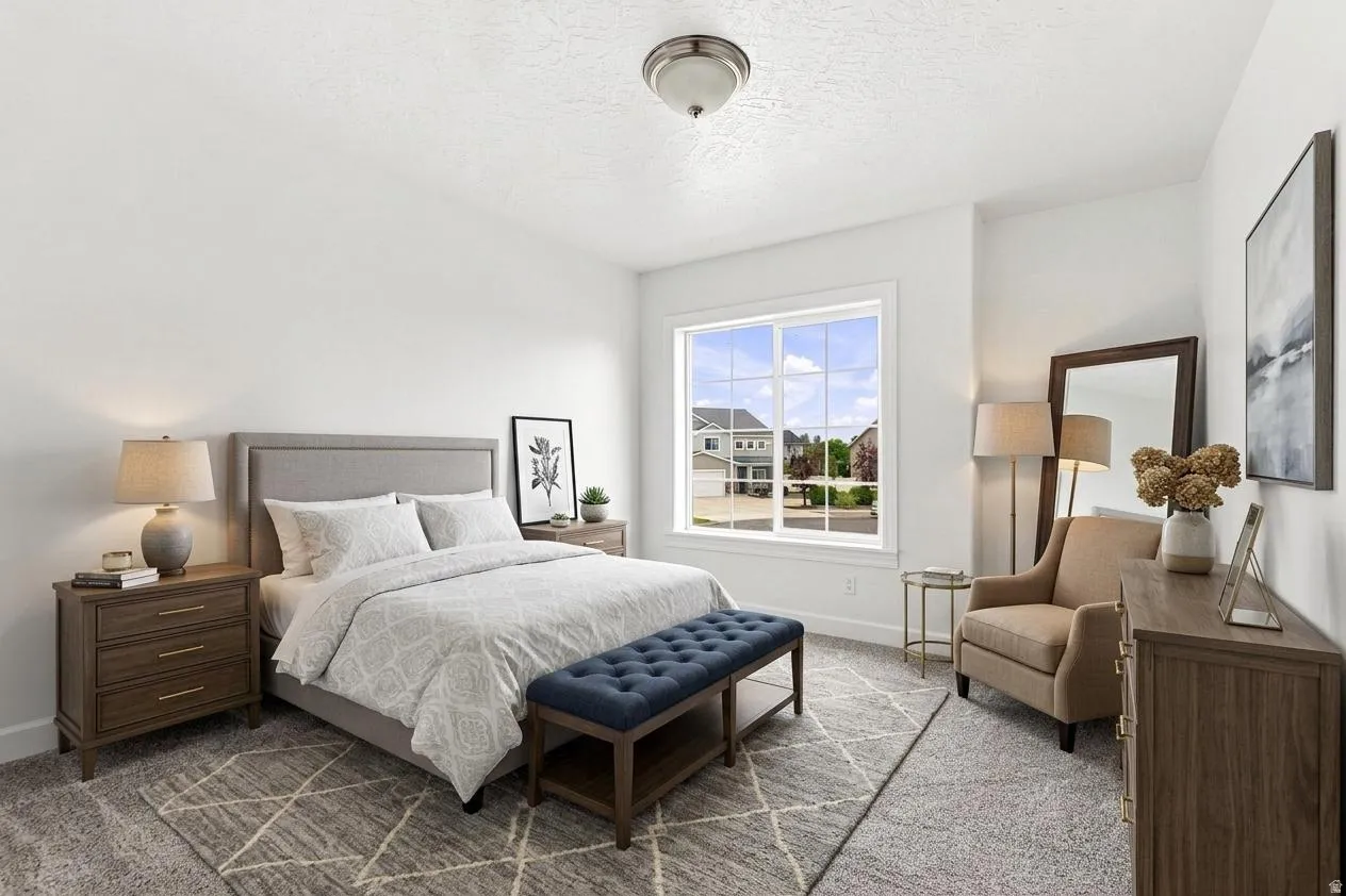 Bright bedroom featuring a large window, neutral wall paint, and recessed ceiling light fixture. AI Generated photo