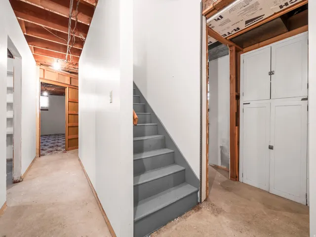 Painted staircase and painted concrete flooring