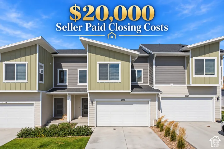Contemporary multi-unit exterior featuring shed rooflines, multi-toned horizontal and vertical siding, attached garages with sectional doors, and recessed entryways