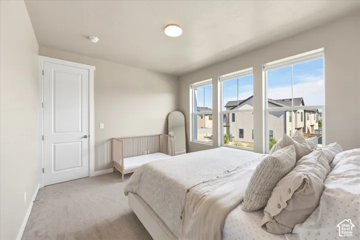 Room with three large windows providing abundant natural light