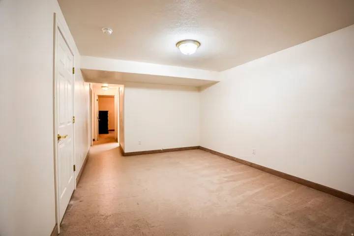Neutral-toned carpeting throughout