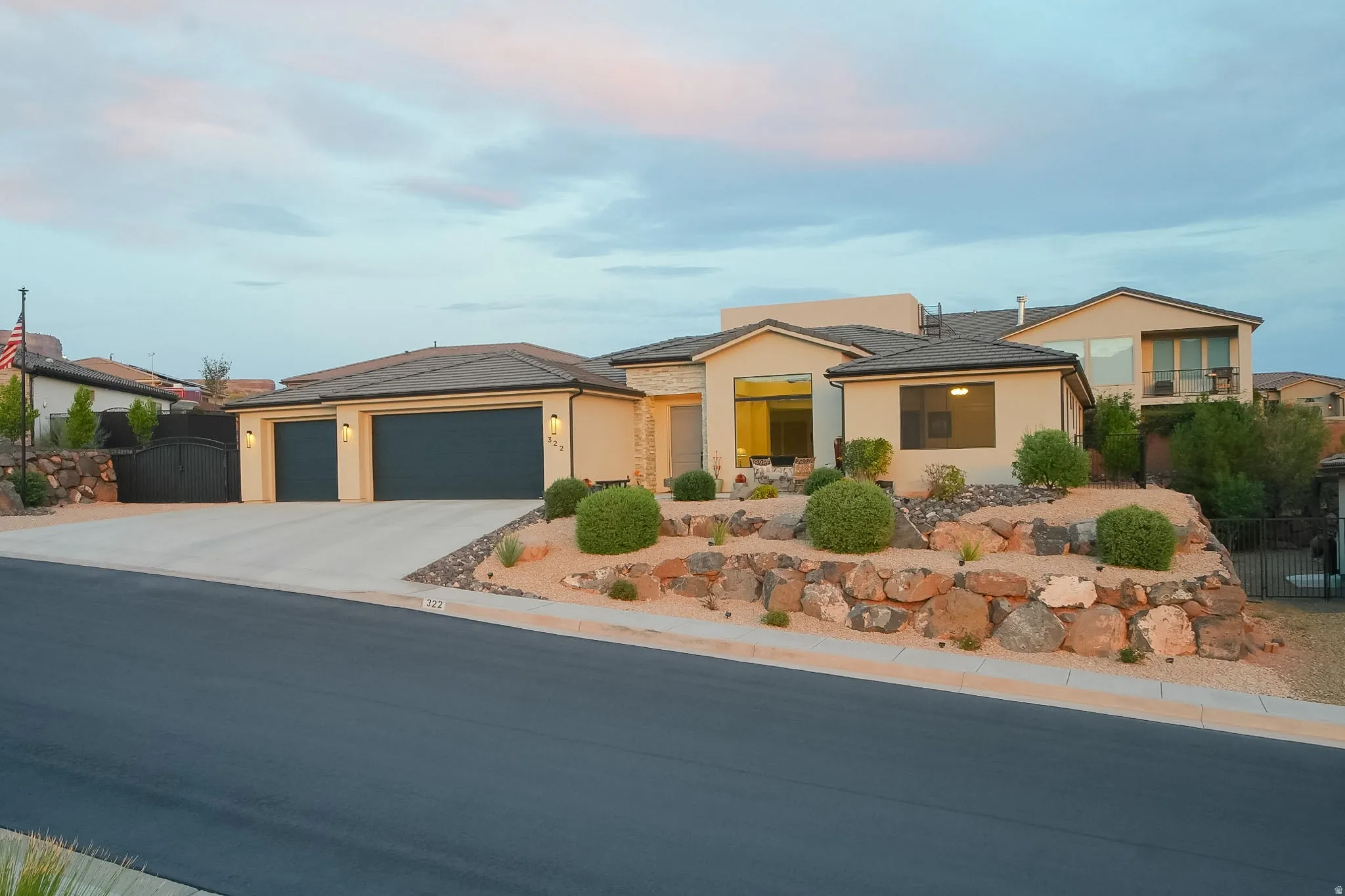 Contemporary desert-style residence with a multi-car garage