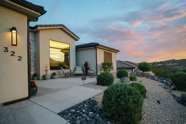 Modern stucco exterior with stacked stone accents