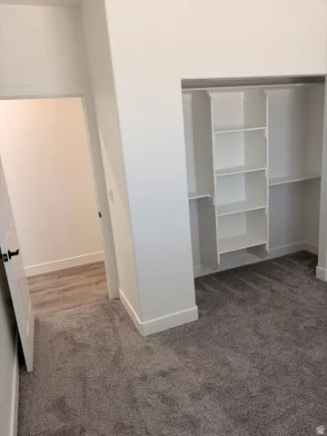Integrated closet shelving with hanging rods