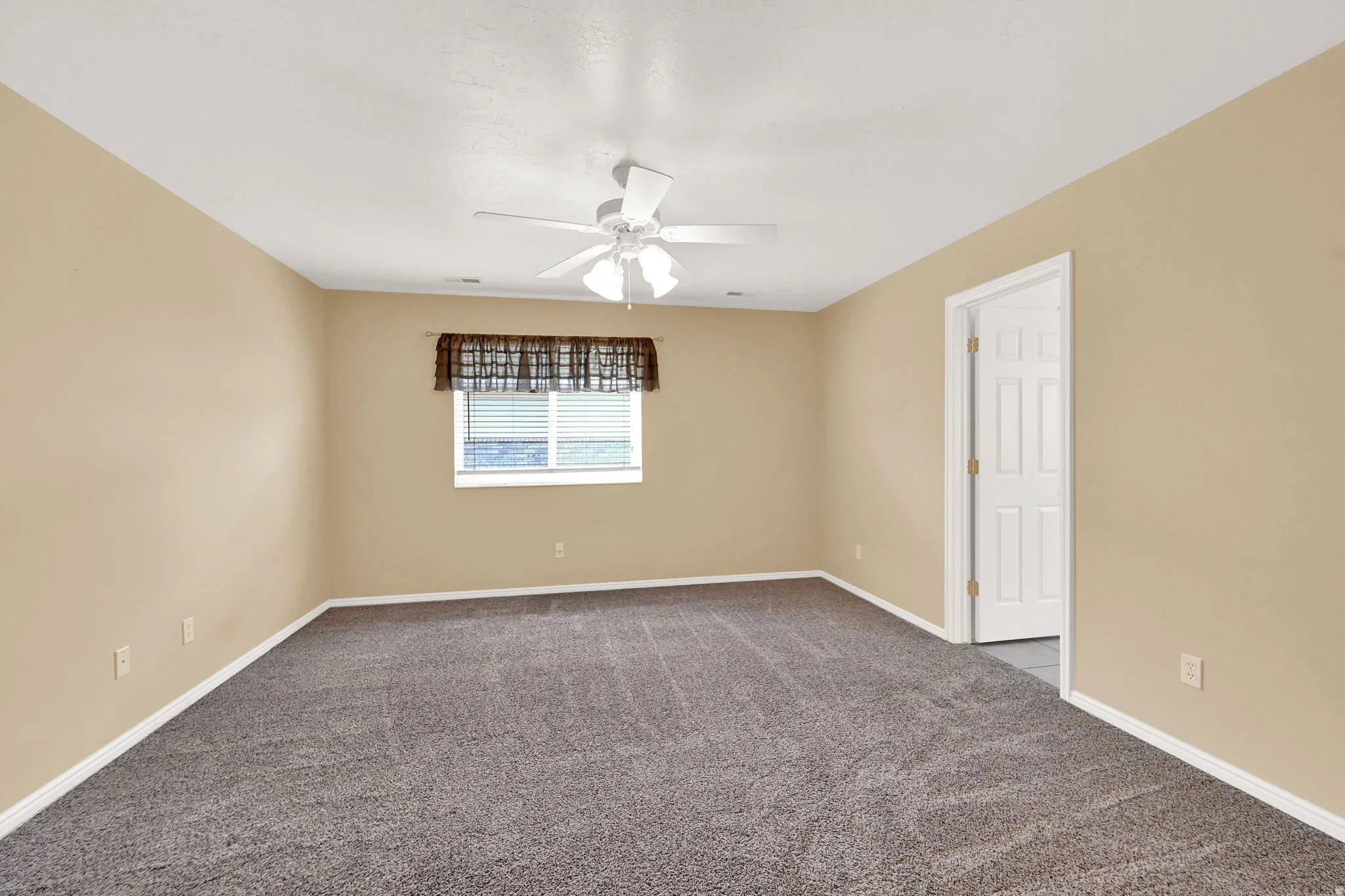 Spacious primary bedroom