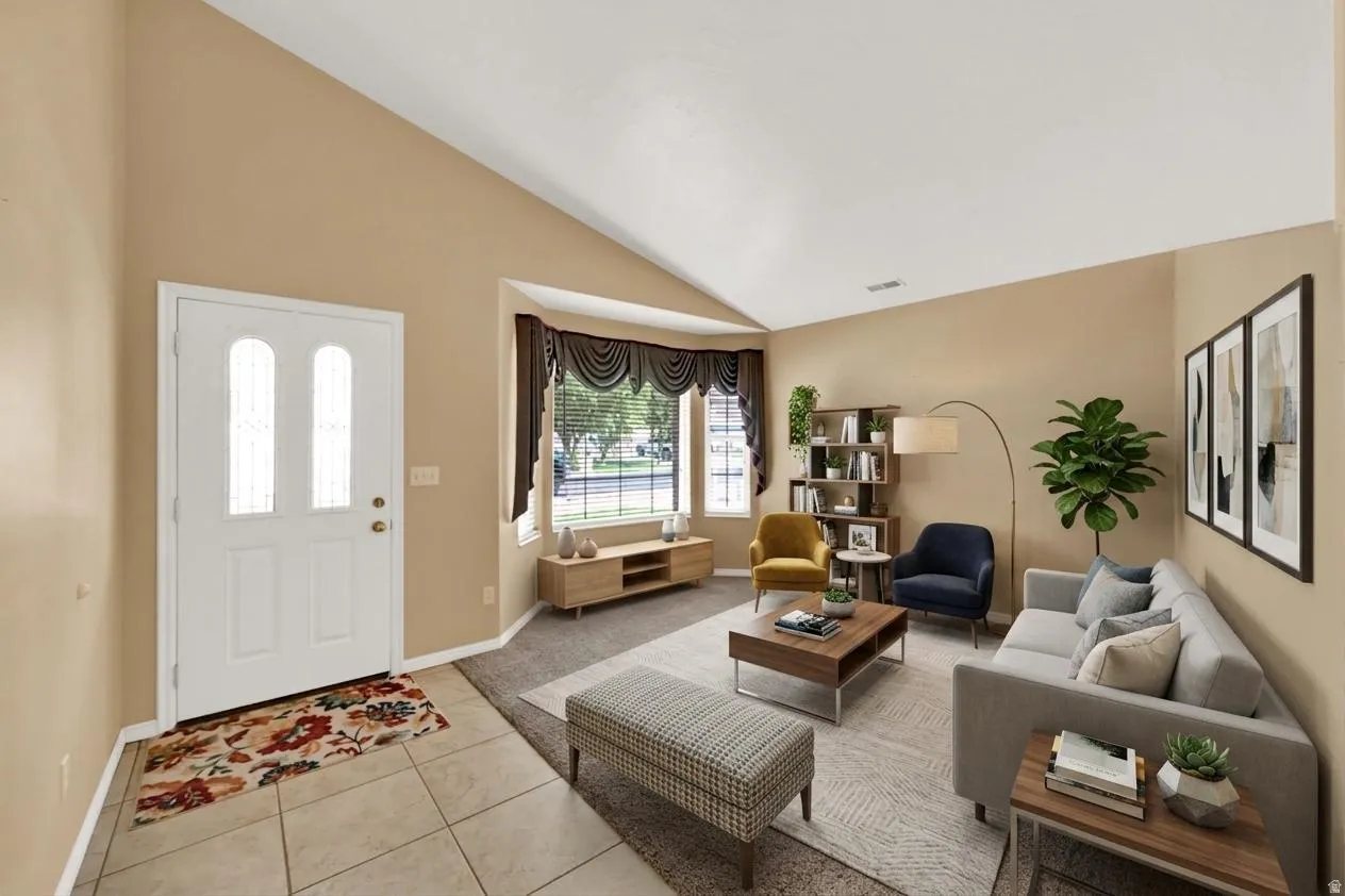 Virtually staged living room with vaulted ceilings and bay window