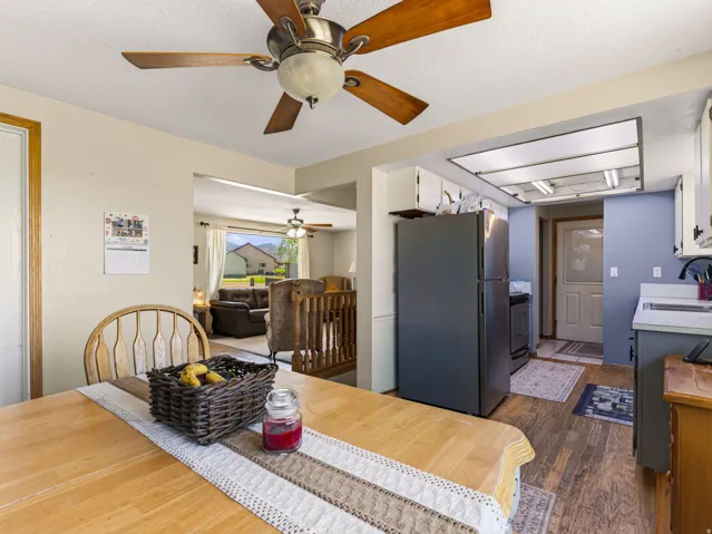 Kitchen area featuring wood-finish flooring and a ceiling-mounted light fixture