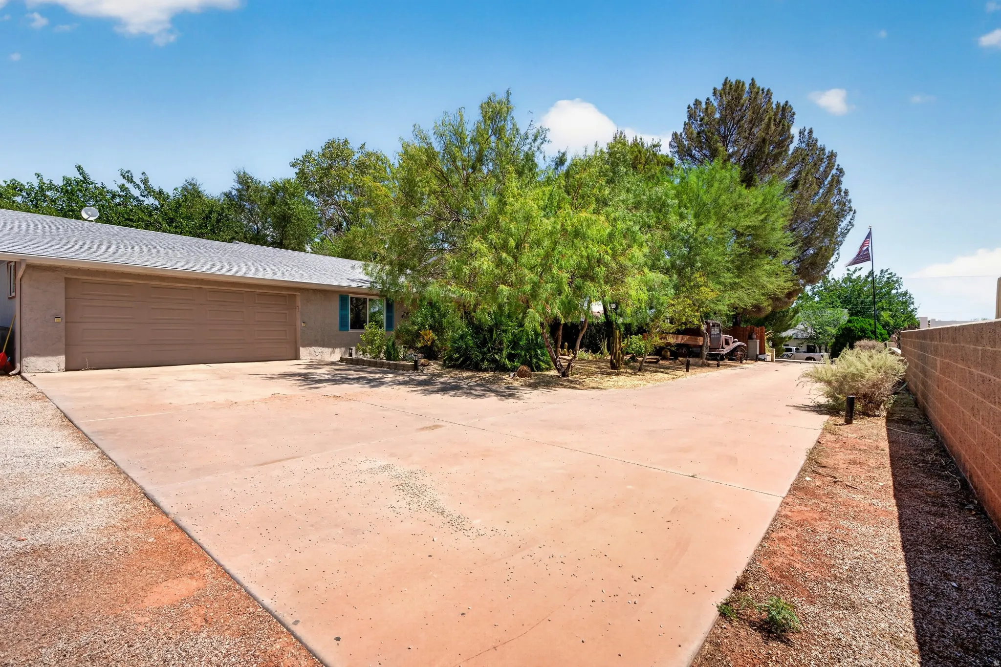 Split concrete driveway providing ample parking