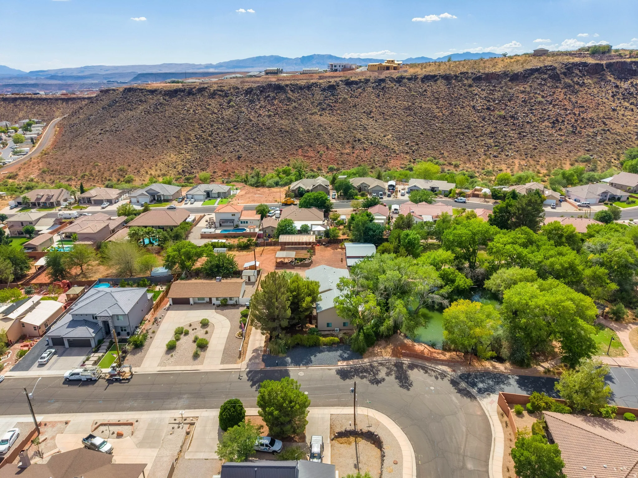 Aerial perspective showcasing a residential neighborhood with varied housing styles