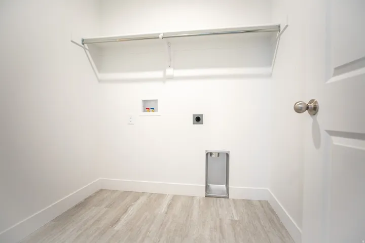 Laundry room with hookups for an electric washer and dryer