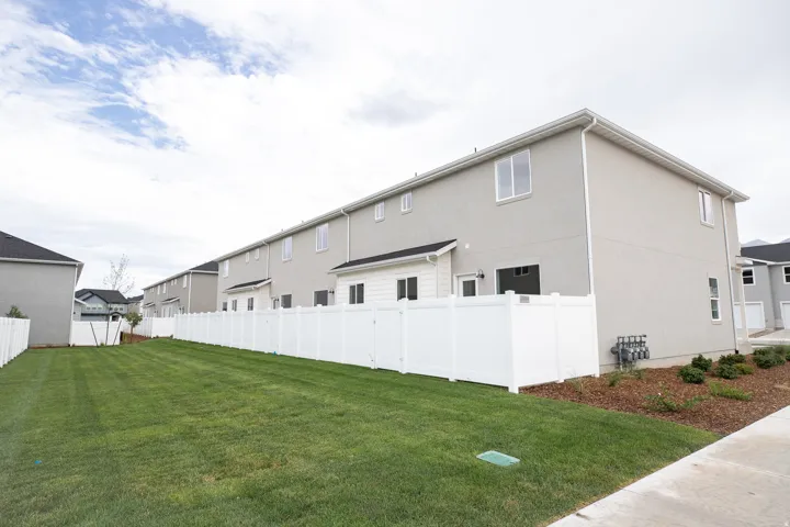 View of the grass area directly behind the townhome