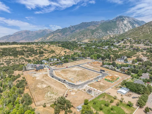 Expansive development site featuring graded lots and new road infrastructure