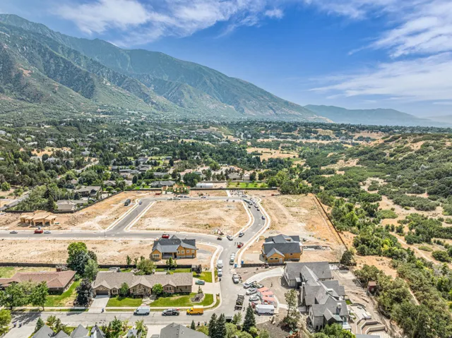 Developing residential area featuring new construction homes and graded lots