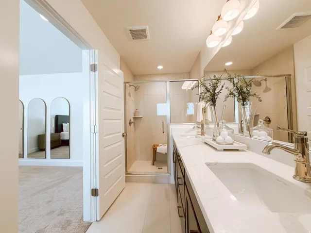 Dual vanity with integrated sinks and a light-toned countertop