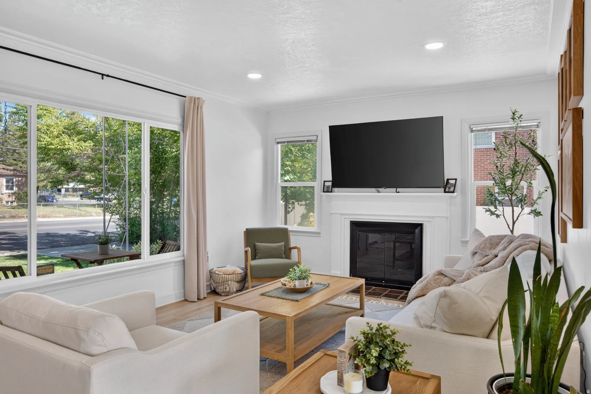Bright living area with large picture windows providing abundant natural light